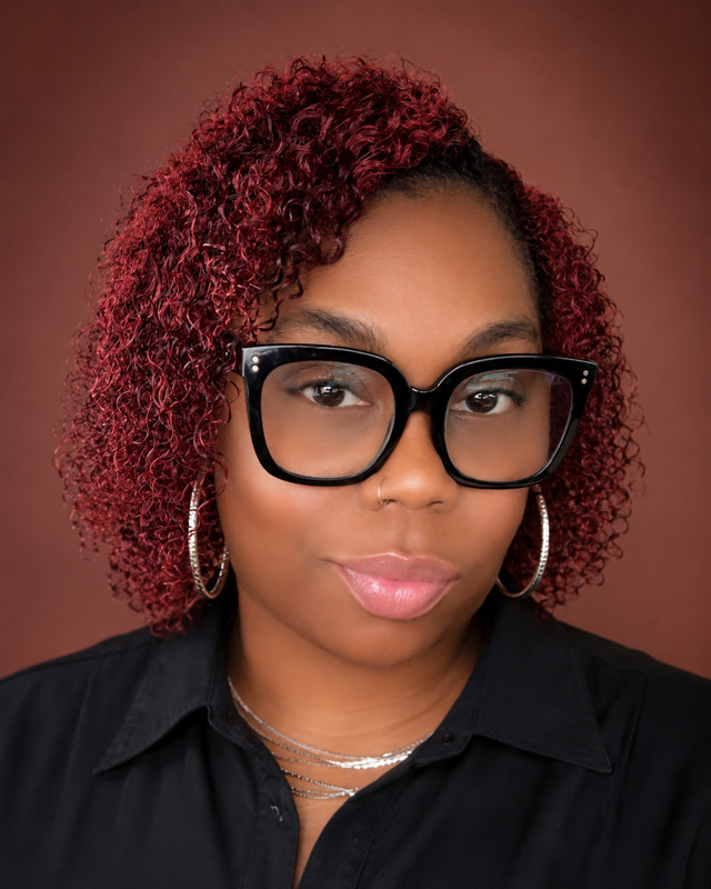 Stephanie Y. Charles, founder of Makes Perfect Scents Candles and More